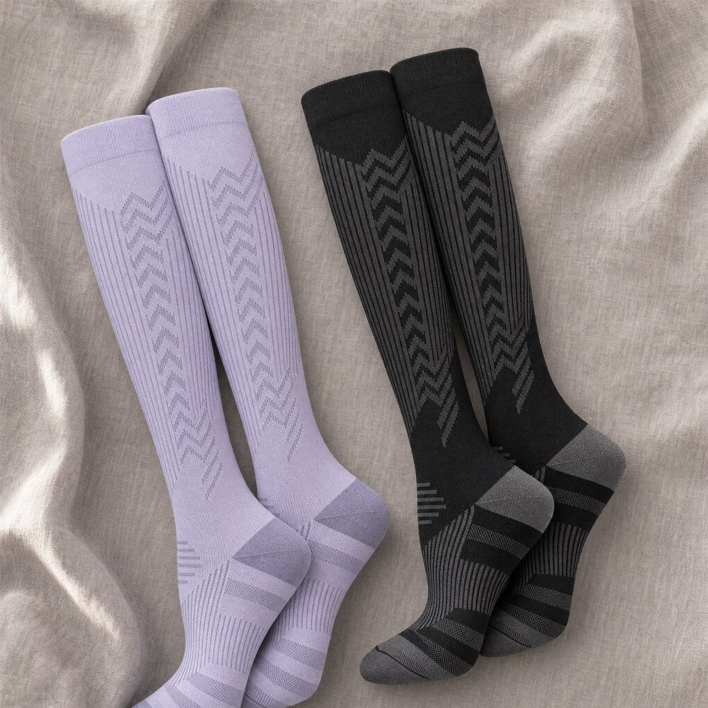 Pair flat-lay of both colorways, cuffs to camera